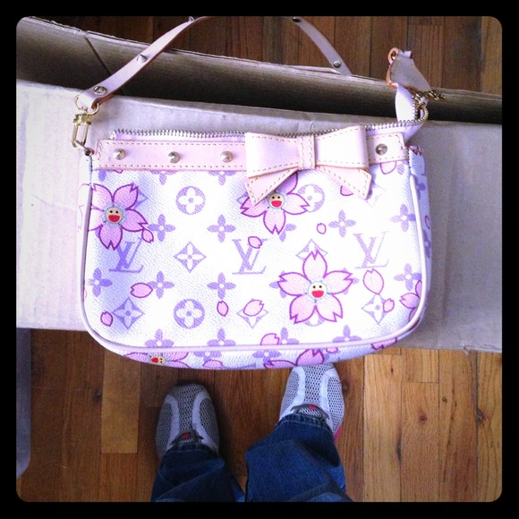 Looks like Louis Vuitton Cherry Blossom pochette
