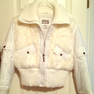 White fuzzy glamorous short ski like jacket.