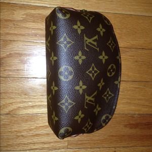 Authentic Louis Vuitton cosmetic purse.