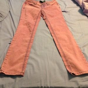 Pinkish purple regular skinny jeans.