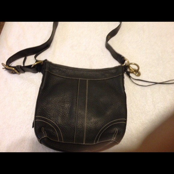 coach leather bag and it is small size.