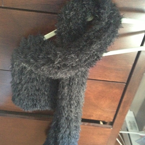 Black furry scarf sold