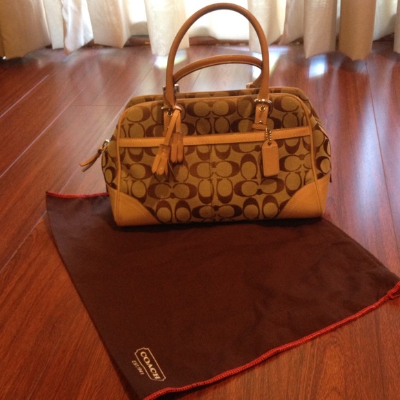 Coach cream colored hand bag