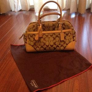 Coach cream colored hand bag