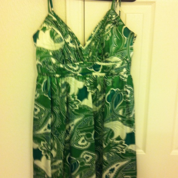 Green and cream colored dress