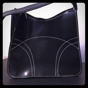Black Kenneth Cole Reaction purse. Medium sized