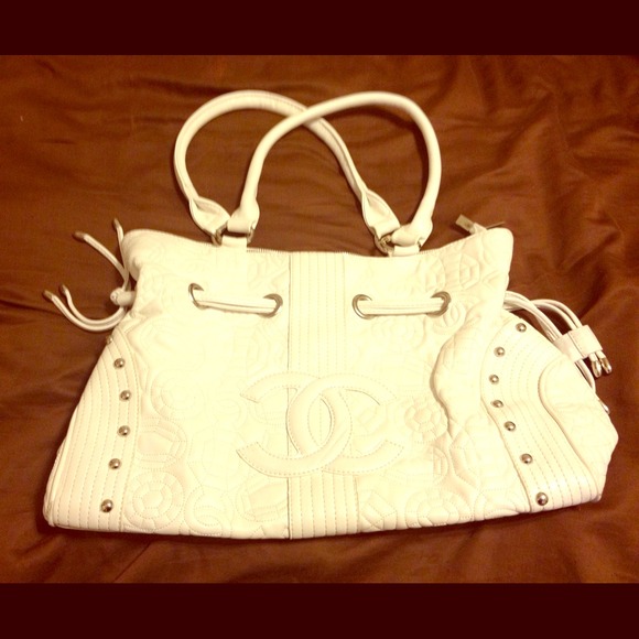 Chanel purse with matching wristlet.