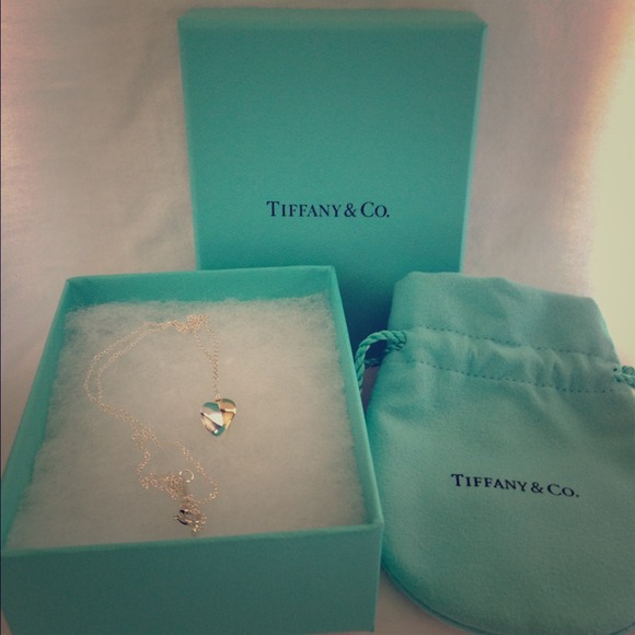 Tiffany & Co. Jewelry - 18K and Sterling Silver Tiffany Mini Heart Pendant