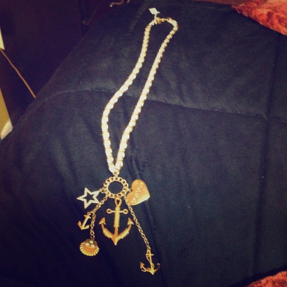 Bebe long charm gold necklace