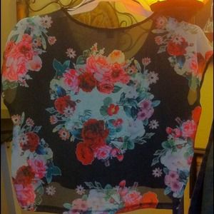 Black loose top with floral back piece.