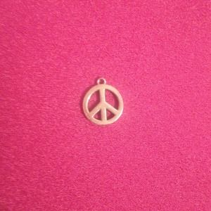 *REDUCED* Tiffany & Co. peace sign charm
