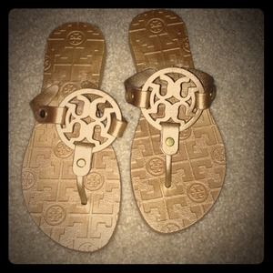 Gold flip flops