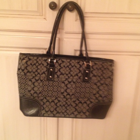 Large sized Black Handbag.