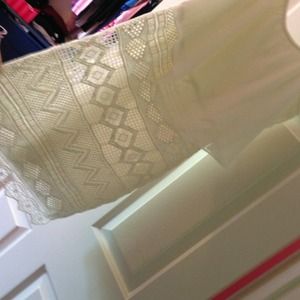 A white dress size 12 tags on it 55