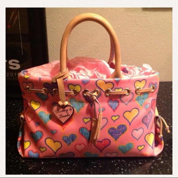 (Sold)Authentic dooney purse, brand new with strip