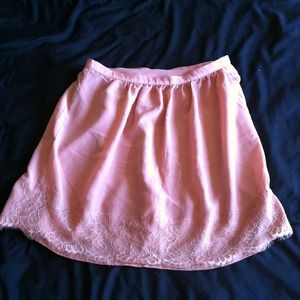 A coral knee-length skirt