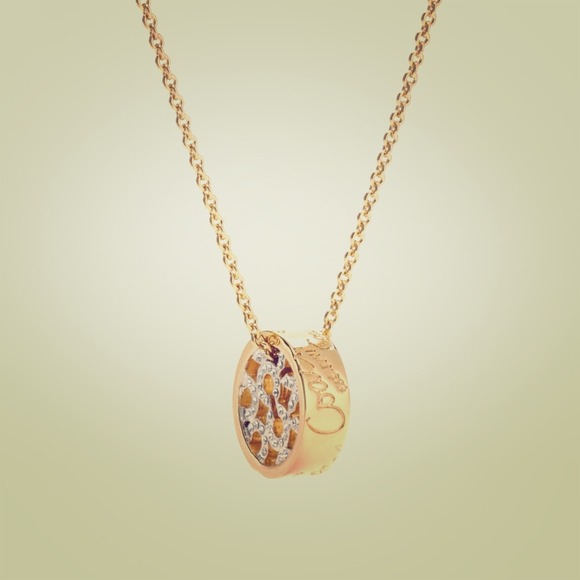 Authentic Coach op art pave disk necklace