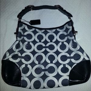 Authentic Black and White Shoulder Coach