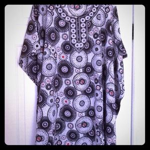 PONCHO STYLE TOP,CLOSED ON SIDES W/ARM HOLES