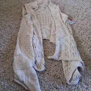 Cream colored sweater vest