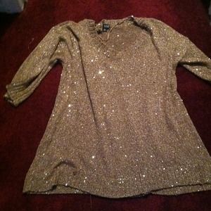 Very pretty sequins tan in color never worn