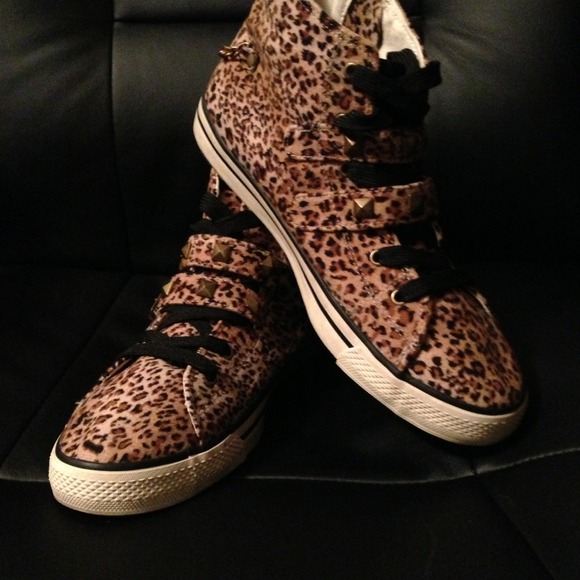 Beautiful pair of cheetah hightop sneakers