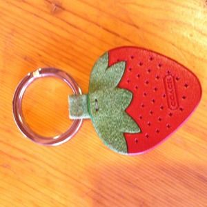 COACH strawberry key fob.
