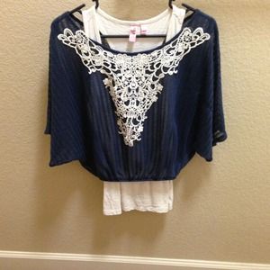 Navy top with off white design. New without tags!