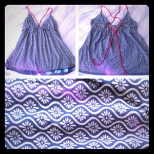 Billabong swing top with criss-cross back.