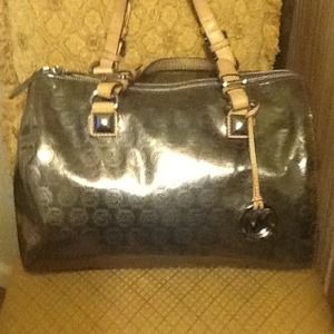 Authentic Michael Kors bag silver monogram jet set