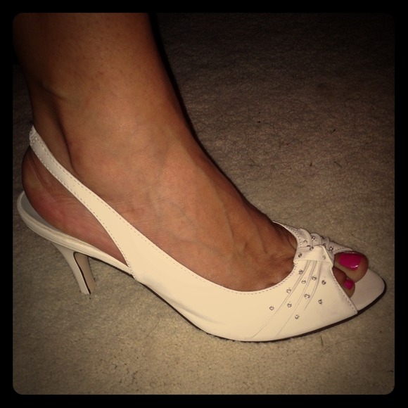 All white 3 inch heels.