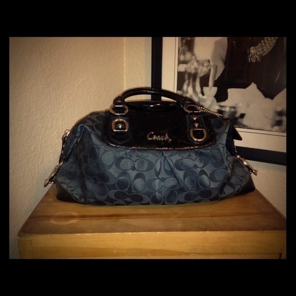 signature large Coach black purse. Good condition.