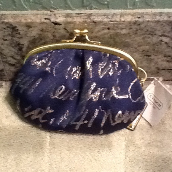 Coach change purse on hold.