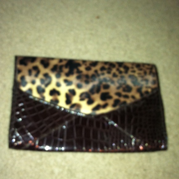 Very nice and new leopard print clutch