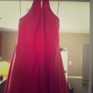 A pinkish orange prom dress