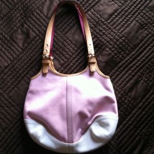 Medium pink and white coach purse