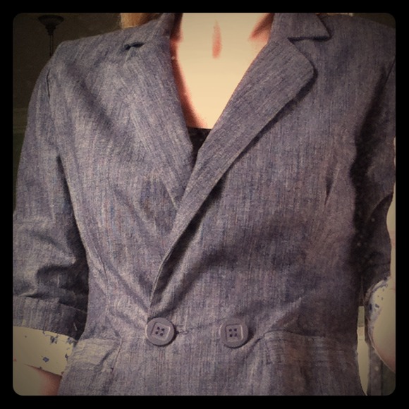 Black blazer with flower lining.