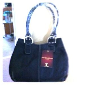 ***JUST REDUCED***Tignanello pebble leather purse.