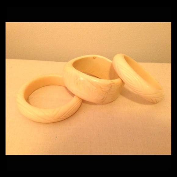 Faux ivory 3 bracelets.
