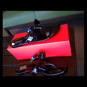 Coach sandals with black bow. Never worn, size 9.