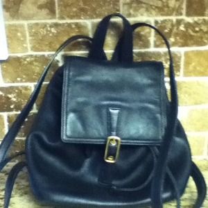 100% authentic coach leather backpack.