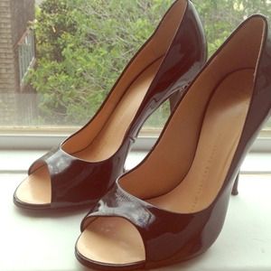 Patent leather heels decked with jewels