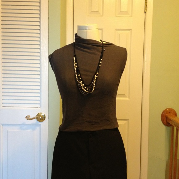 Grey knit top with asymmetrical neck line