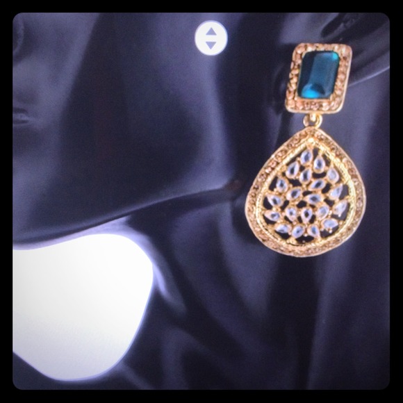 Green emeralds with gold finished dangler earirngs