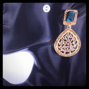 Green emeralds with gold finished dangler earirngs