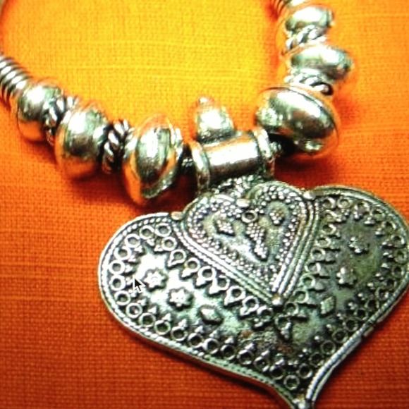 Silver leaf shaped pendant necklace with chain