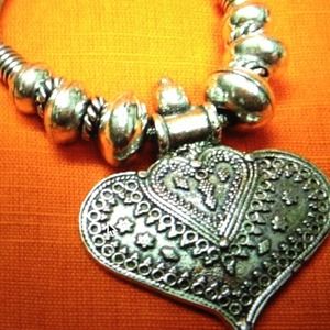 Silver leaf shaped pendant necklace with chain