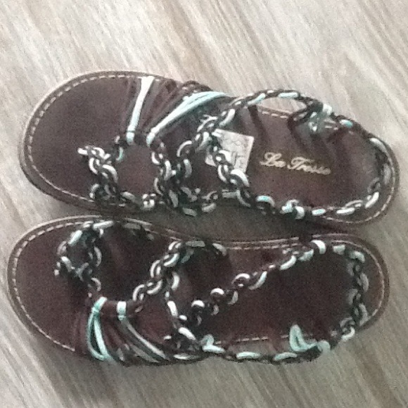 SOLD Teal and brown sandles bought in france. Nwot