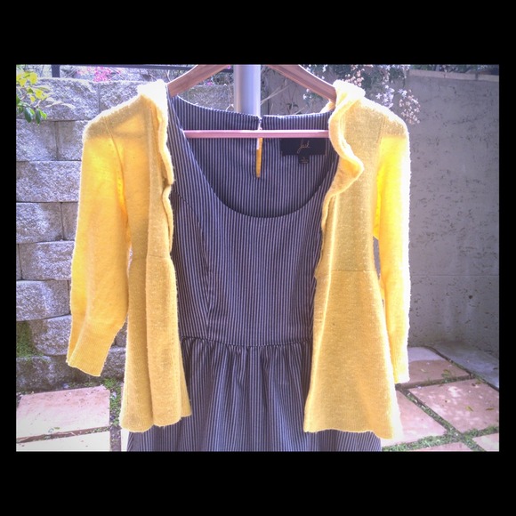 Adorable striped dress with yellow sweater.