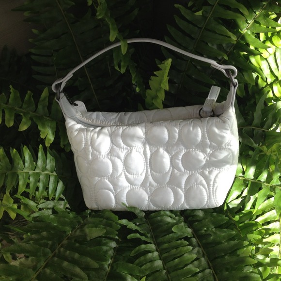 SOLD Authentic Coach make up bag.